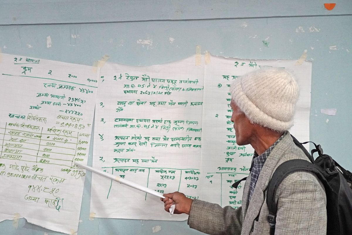 Participants worked in groups to develop business plans for products with potential for commercialization. Pictured here is a group presenting their business plan for beekeeping and honey production.