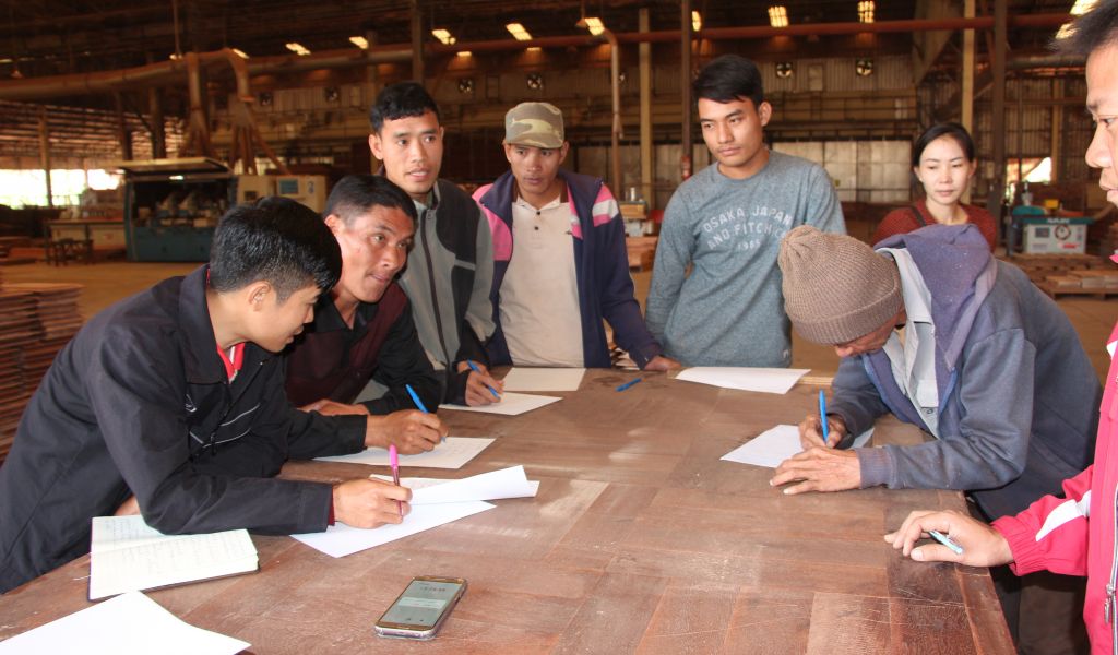 People discussing around a table