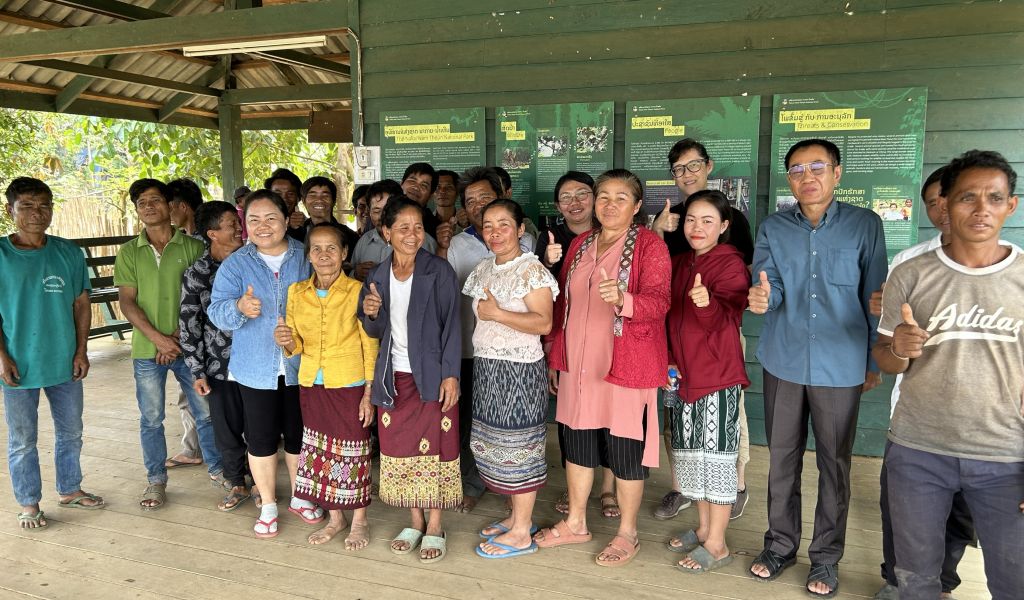 Community members in Nahao village, Khammousane province, Lao PDR with Hao Zhuang (fourth from right), Explore’s program manager and Chanhsamone Phongoudome (third from left), member of the Explore Program Advisory Committee. 