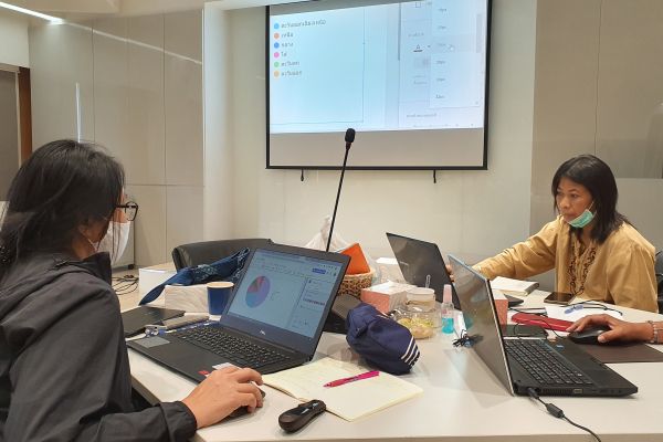 Women working on computer during data literacy training